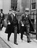 Original title:  Rt. Hon. Robert Borden and Hon. Winston Churchill leaving the Admiralty. 