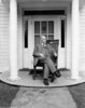 Original title:  W.L. Mackenzie King, former Prime Minister of Canada, seated in a chair presented to him at Tyree, Scotland, in 1937. This is the last photograph of Mr. King at Kingsmere. 