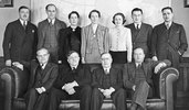 Original title:    DescriptionRowell-Sirois Commission 1938.jpg English: The members of the Rowell-Sirois Commission (the Royal Commission on Dominion-Provincial Relations) in 1938, after Newton Rowell resigned as co-chair because he had suffered a stroke. Seated, from left to right: Prof. H.F. Angus, Mr. J.W. Dafoe, Prof. Joseph Sirois (chairman) and Prof. R.A. MacKay. Standing behind them are commission staff members. Français : Les membres de la Commission Rowell-Sirois, en 1938, après que Newton Rowell eut démissionné du poste de président à la suite d’un accident vasculaire cérébral. Assis de gauche à droite : le professeur H.F. Angus, M. J.W. Dafoe, le professeur Joseph Sirois (président) et le professeur R.A. MacKay. Debout derrière eux, on peut voir les employés de la commission. Date 1938 Source This image is available from Library and Archives Canada under the reproduction reference numb