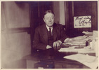 Original title:  Photograph of Edward Bayly (1865-1934) seated at a desk. Date: [1932?]. Reference code: P1255. Source: Archives of the Law Society of Upper Canada (https://www.flickr.com/photos/lsuc_archives/4566456396/in/photolist-7XwhoQ-7KgZEh-7FVyun-eM3EiT-jDiUzf-jDiVTN-nSf5oP).