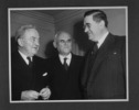 Original title:  Rt. Hon. C.D. Howe with executives of the Canadian Pacific and Canadian National Railways. (Left to right): Mr. W.A. Mather, Mr. Howe, Mr. Donald Gordon. 