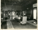 Original title:  Image from Hamilton Public Library, Local History and Archives.
Wesanford, dining room, after 1917. A door at the southern end of the drawing-room leads into the dining-room, which many consider the handsomest portion of the house... The decorator has treated it in the style of the German renaissance and the big room, 50x28, lends itself well to this massive manner of handling, especially as the ceiling is twenty feet high, and the eastern end of the room is semi-circular. Around the sides runs a mahogany wainscotting, nine feet in height, panelled with fine Swiss wood-carvings of fruit, fish and game. ... An old brass chandelier of seventy-two lights hangs over a hospitable looking mahogany table twenty-eight feet long, of oval shape, with massive carved legs. This table can be enlarged on festive occasions to sixteen by thirty-three feet. Hamilton Spectator, June 8, 1892

The dining room table now stands in the Officers' Mess of the Royal Hamilton Light Infantray, in the John Weir Foote Armouries.  Not shown in the photo was the mechanical pipe organ, or Orchestrion. 