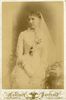 Original title:  Fannie M. Barnard, épouse de Jules Tessier en robe de mariée – J. E. Livernois Photographe, Québec – juin 1882.