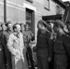 Original title:  Hon. T.C. Douglas, Premier of Saskatchewan, talking with Private P. Campbell of The Saskatoon Light Infantry (M.G.), Barneveld, Netherlands, 29 April 1945
Library and Archives Canada, PA-138035
MIKAN no. 3524858 