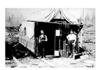 Original title:  Fort George Tribune office, John Houston on left

Photographer Unknown 

Photo taken 1910 

BC Archives # D-07317