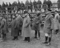 Original title:  (Spectators) Premier Borden, Gen. Currie and Gen. Macdonnell watching Baseball final. - "Corps Sports, Brussels, 22nd March 1919. 