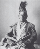 Original title:    Description English: Photograph of Dr. Peter Edmund Jones, in the buckskin suit inherited from his father. The suit is decorated with porcupine quills and symbols of the Eagle totem. Jones holds a war club, and the tomahawk pipe Sir Auguste D'Este gave Jones' father. Jones may also have one of the feathers from his father's naming ceremony. Date 1898(1898) Source American Anthropologist Volume 11, 1898; also catalogued as Photo #498-a-I in Smithsonian records Author Unknown Smithsonian Photographer Permission (Reusing this file) Public domainPublic domainfalsefalse This media file is in the public domain in the United States. This applies to U.S. works where the copyright has expired, often because its first publication occurred prior to January 1, 1923. See this page for further explanation. Català | Česky | Deutsch | English | Español | Eesti | فارسی | Suomi | Français | Gaeil