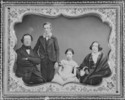 Original title:  Thomas Kirkpatrick and his family. From left to right: Thomas Kirkpatrick, a son of about 15 years old (George Airey?), a daughter (Helen Lydia?), Mrs. Thomas Kirkpatrick (née Helen Fisher) 