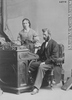 Original title:  Photograph Professor Cornish and lady, Montreal, QC, 1866 William Notman (1826-1891) 1866, 19th century Silver salts on paper mounted on paper - Albumen process 14 x 10 cm Purchase from Associated Screen News Ltd. I-23714.1 © McCord Museum Keywords:  mixed (2246) , Photograph (77678) , portrait (53878)