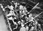 Original title:  Survivors in one of Athenia's lifeboats alongside City of Flint