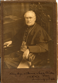 Original title:  Courtesy Archives of the Roman Catholic Archdiocese of Toronto (ARCAT). Seated portrait of Archbishop Neil McNeil. Photograph taken in Vancouver, likely while McNeil was Archbishop of Vancouver, bewteen 1910-1912. Creator: G.G. Wadds, Vancouver, BC.