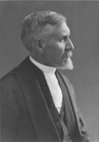 Original title:  Archives of the Law Society of Ontario. Portrait photograph of Herbert Hartley Dewart (1861-1924). Date: [ca. 1912]. Photographer: Charles Aylett. 
Source: https://www.flickr.com/photos/lsuc_archives/4408851157/in/photolist-7HAvR8.

